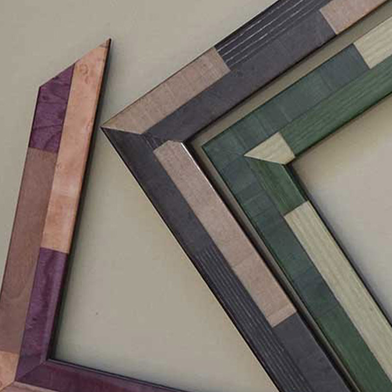 Thumbnail | Three Corner Samples of Frames with Color Blocking in Purple, Grey, and Green